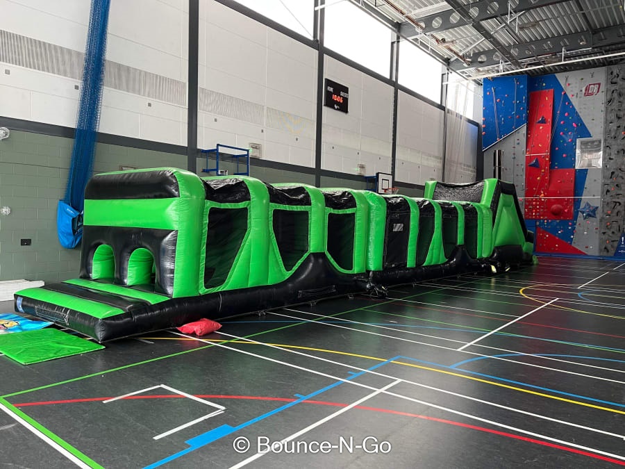 Green Black Adrenaline Obstacle Course Bouncy Castle Hire